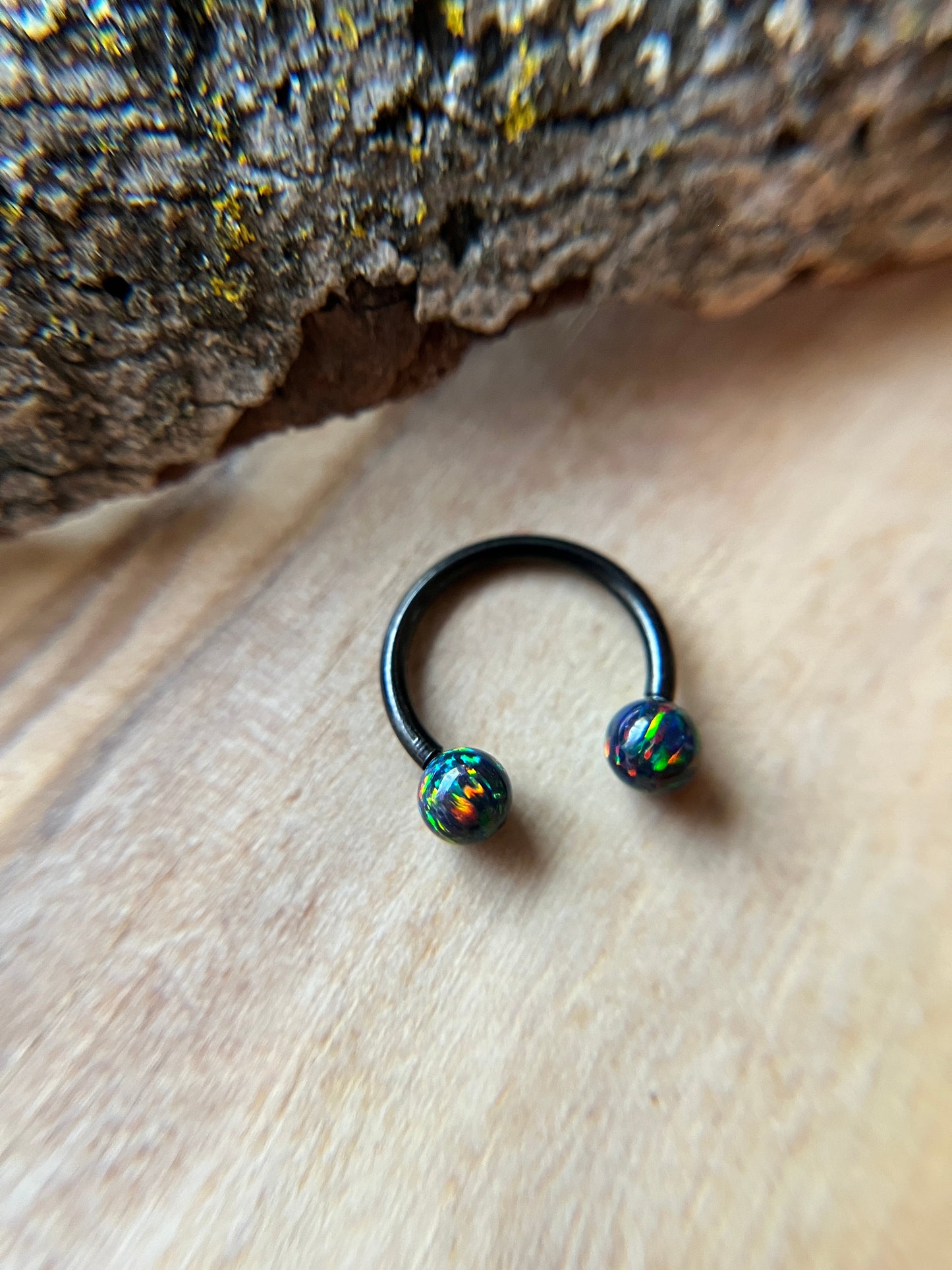 Fire Opal Internally Threaded Black Titanium Ion Plated Horseshoe Ring