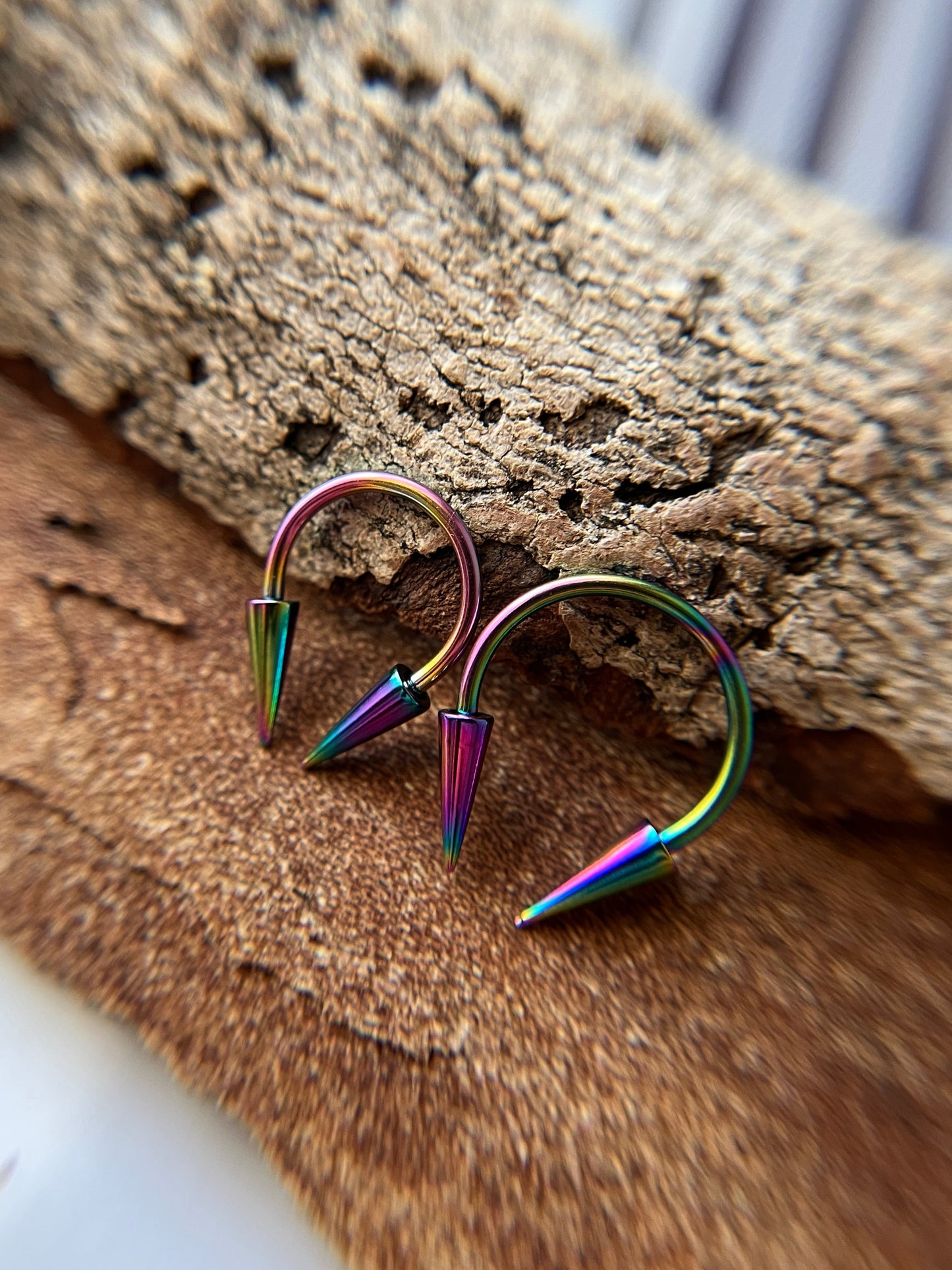 Rainbow Titanium Ion Plated Slender Long Spikes 16G Horseshoe Ring